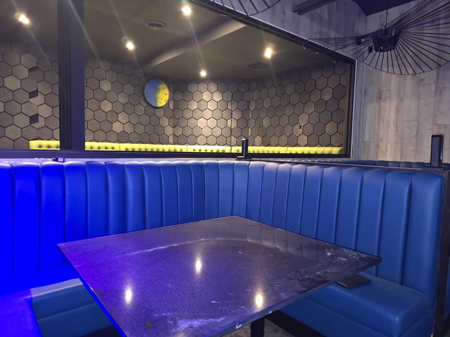 VIP booth seating in electric blue leather